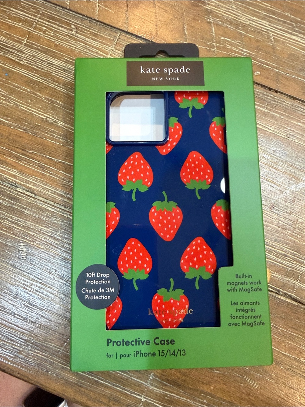 kate spade navy phone case with red strawberry print